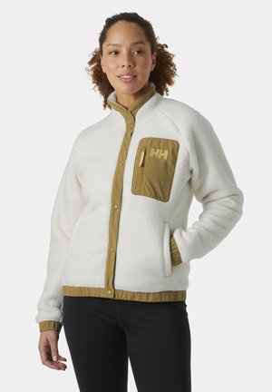 Fleece jacket in white with a brown zippered chest pocket and snap closure. Features ribbed cuffs and hem, offering a textured finish.