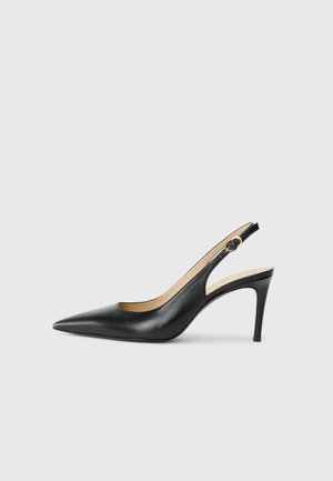 Black leather slingback high heels with a pointed toe, adjustable strap, and a sleek stiletto heel, featuring a smooth finish.