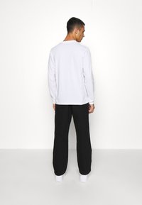 Carhartt WIP DOUBLE KNEE PANT - Calças - black rinsed