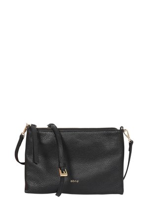 Black leather crossbody bag with a textured finish, gold hardware, zipper closure, and detachable strap. Features embossed brand name.
