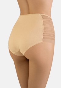 Hoge taille beige onderbroek met een soepele stof aan de voorkant en gestreepte doorzichtige panelen aan de zijkanten, met golvende afwerking langs de tailleband.