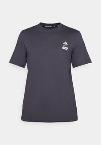 Temno siva kratka majica s kratkimi rokavi iz mehkega materiala, ki ima na prsih bel logotip Adidas in napis "Star Wars". Okrogla izrez.