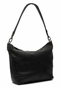 Sac à bandoulière en cuir noir avec une texture lisse, une forme courbée et une sangle ajustable. Présente des coins arrondis et des détails de couture subtils.