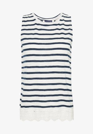 Bílý top bez rukávů s námořnickými horizontálními pruhy a volánkovým krajkovým lemem. Vyroben z lehkého materiálu s uvolněným střihem.