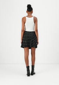 Tommy Jeans MINI SLIP SKIRT - Minijupe - black