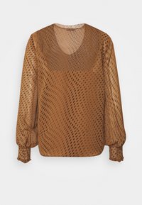 Blouse à manches longues en tissu brun transparent avec un motif noir en vagues, dotée d'un col rond et de poignets froncés.