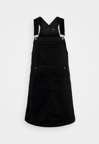 Svart manchester-klänning med justerbara axelband, rak skärning, två framfickor och silverfärgade detaljer.