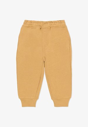 Tan katoenen sweatpants met een elastische tailleband, zijzakken en ribgebreide boorden. Zachte textuur, tapered fit en een gladde afwerking.