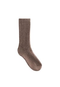 Calzino marrone a coste realizzato in materiale morbido, con una sottile texture e una punta arrotondata, progettato per comfort e calore.