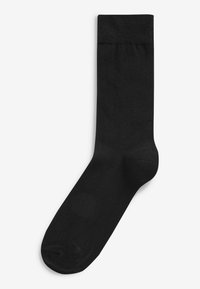 Schwarze Socke aus einem weichen, glatten Material. Verfügt über einen gerippten Bund sowie verstärkte Fersen und Zehen für zusätzliche Langlebigkeit. Standard Crew-Länge.