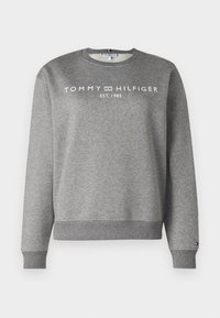 Szara bluza z okrągłym dekoltem, ściągaczami na mankietach i u dołu. Na przodzie biały napis "TOMMY HILFIGER EST. 1985".