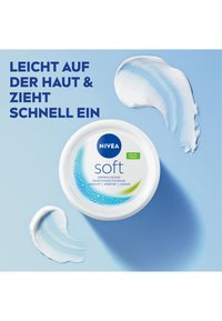 NIVEA Soft cream in a round white container features blue accents and droplets, with a smooth, creamy texture displayed beside it.