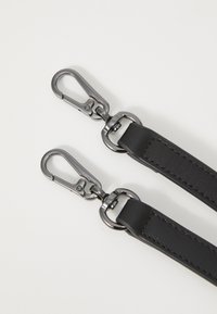 Black leather strap with a textured surface, featuring two metal clips with a sleek, shiny finish and round attachment rings.