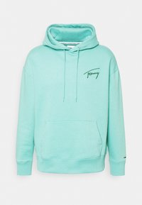 Sudadera XL de color azul claro con capucha ajustable, bolsillo tipo canguro en la parte frontal y logo bordado de "Tommy" en el pecho.