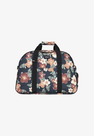 Blumen-Duffle Bag mit navy Hintergrund, großen Hibiskusblüten in Rosa- und Orangetönen, schwarzen Griffen und einem Markenpatch.