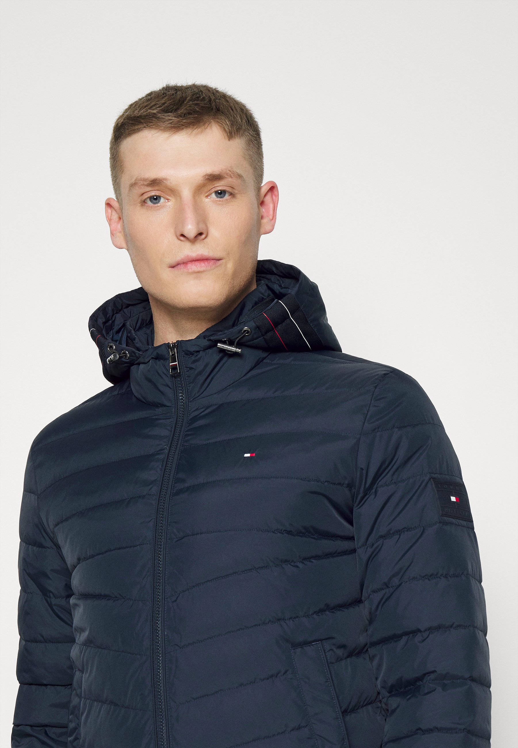 tommy hilfiger rolling duffel bag