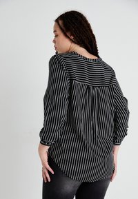 ONLY Carmakoma CARANITA SHIRT - Blouse - black/white