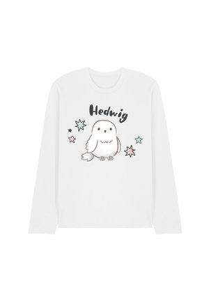 White long-sleeve shirt with a cartoon white owl, stars around it, and the word "Hedwig" above the owl on the front.