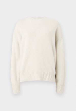 Textured cream sweater with a ribbed crew neckline and cuffs. Features a relaxed fit and slightly dropped shoulders. No visible patterns.