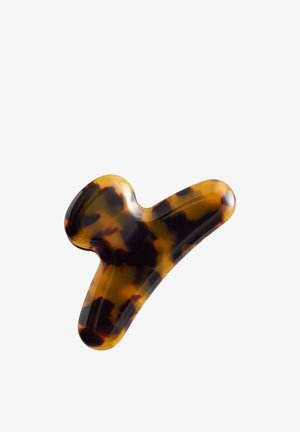 Hårklemme med skildpaddepantermønster, tre tænder, afrundede kanter og blank finish på hvid baggrund.