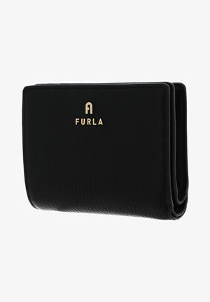 Black leather wallet with textured finish, gold "FURLA" logo, compact design, and folded edges showcasing sleek hardware.