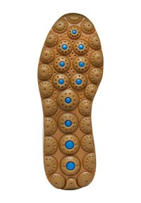 Suela de zapato con una base de goma marrón claro, que presenta patrones circulares y elevados con acentos azules. Incluye perforaciones para ventilación.