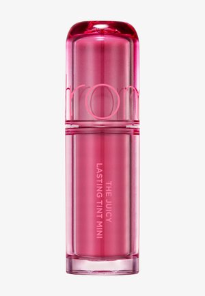 Lille cylindrisk lyserød lip tint-beholder med gennemsigtigt låg og teksten "The Juicy Lasting Tint Mini" på kroppen.