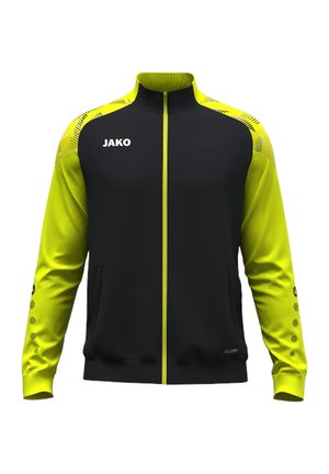 Czarna i jaskrawożółta sportowa kurtka na zamek błyskawiczny z długimi rękawami, wysokim kołnierzem, logo JAKO na piersi oraz kieszeniami po bokach z przodu.