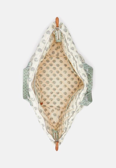 Quilts auduma soma ar piparmētru zaļiem akcentiem un bēšas krāsas ziedu oderi, ar rāvējslēdzēju un ādas vilkšanas cilpām.