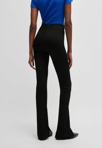 HUGO Spodnie materiałowe