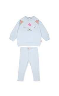 Ensemble en coton bleu clair comprenant un haut avec un design de visage de chat, des accents pailletés, et un legging côtelé assorti avec des ourlets effilochés.