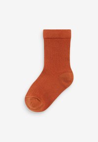 Sosete dintr-un amestec de bumbac, până la glezne, de culoare portocalie arsă. Textură ribbed cu călcâi și vârf întărite. Design clasic și simplu.