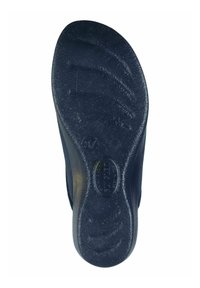 Navy shoe sole made of textured rubber with curved grooves and stamped size "37" and brand "LOTA." Designed for traction and comfort.