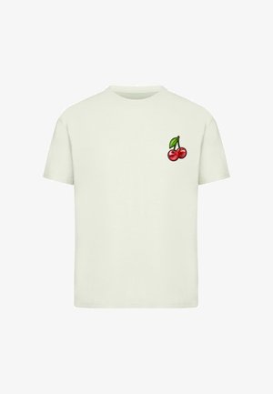 Light-colored cotton t-shirt featuring a small graphic of two red cherries with a green leaf on the left chest area.