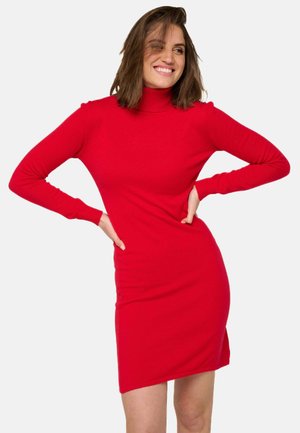 Rotes Strickturtleneck-Kleid, figurbetont mit langen Ärmeln und einem leicht asymmetrischen Saum, aus weichem, dehnbarem Material gefertigt.