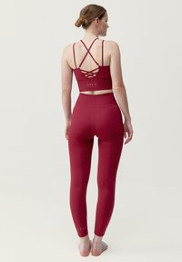 Born Living Yoga INDIA - Legíny - burdeos