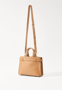 Tan leather handbag with a structured design, top handles, and a detachable, adjustable shoulder strap. Smooth texture and gold-tone hardware.
