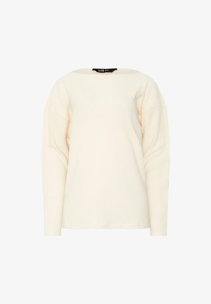 Pitkähihaainen paita vaaleassa ribbikankaassa, jossa on leveä kaula-aukko ja hieman väljä istuvuus. Tunnus näkyvissä kauluksessa.