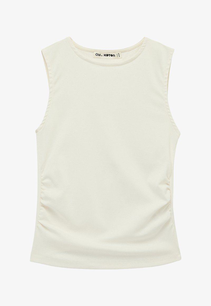 Haut pour femme sans manches couleur ivoire avec encolure ronde et fronces discrètes sur les côtés, étiqueté "Olé Koton" à l'intérieur du col.
