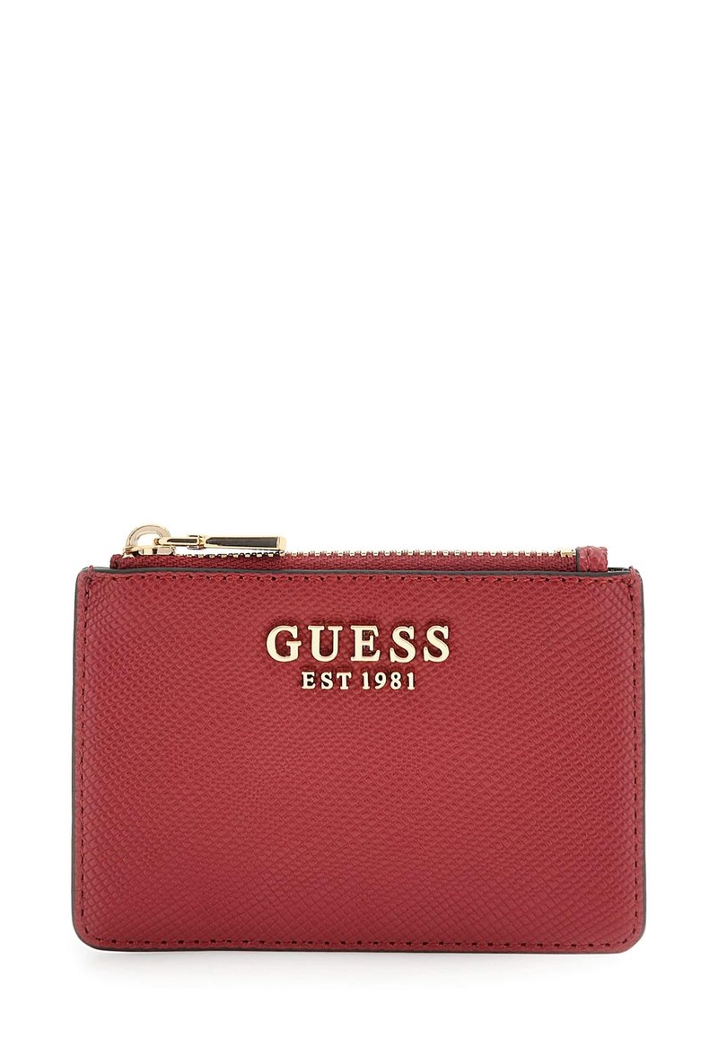 Red textured leather Guess cardholder with gold logo and zipper on top.