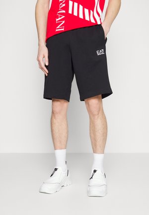 BERMUDA - Tracksuit bottoms - black