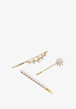 Three hairpins: one gold with white pearls grouped, one with a row of pearls, and a third with a flower-like design of pearls.
