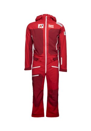 Red ski suit with a zipper front, adjustable hood, and multiple zippered pockets. Made from durable, water-resistant fabric with contrasting panel designs.