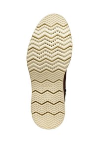 Suela de zapato de goma marrón con un patrón en zigzag, que presenta agujeros de ventilación y un color beige. Las marcas incluyen "GEOX" y "PATENTE ITALIANA."