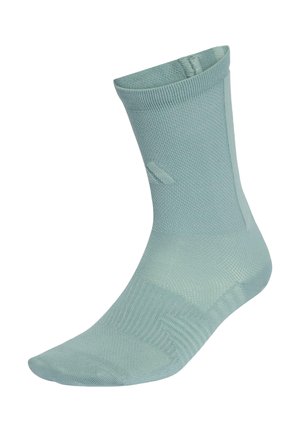 Calzino azzurro chiaro alla caviglia con trama a coste e rinforzi su tallone e punta, progettato per comfort e traspirabilità.