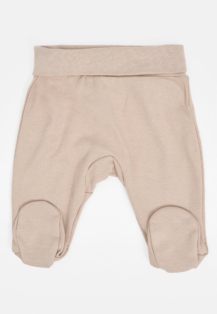 Leggings para bebé en color beige, hechos de un tejido suave, con una cintura ancha, rodilleras redondeadas y una textura simple y lisa en toda su superficie.