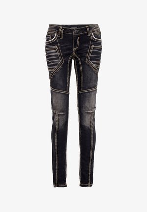 Zwarte denim jeans met contrasterende gele stiksels, een slim-fit ontwerp en textuurdetails. Voorzien van meerdere zakken en een ritssluiting.