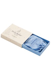 Lyseblå stoftrækpose inde i en pastelæske, med "Peter Rabbit" branding og farverige prikker på låget.
