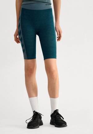 Türkise Radshorts aus strukturierter Stoff, mit hohem Bündchen und einem kontrastierenden grauen Seitenpanel mit Chevron-Muster-Akzenten.