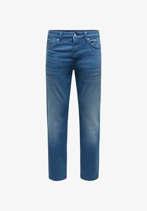 Plave traperice s ravnim nogavicama, koje imaju pet džepova, kopčanje na gumb i blago izblijedjele dijelove na bedrima. Glatka tekstura.